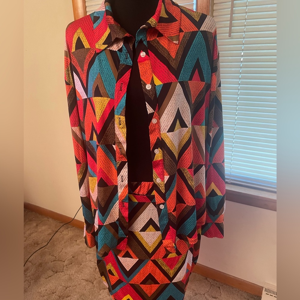 2 piece matching outfit (stretchy) blouse and skirt!!! This is a must have.